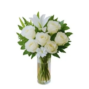 Arranjo de Flores Brancas no vaso de Vidro