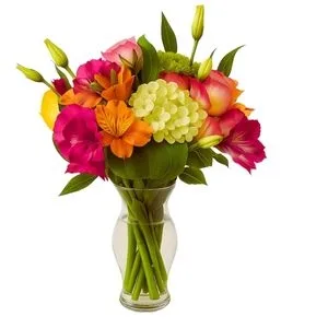 Arranjo de Flores do Campo em Tons Rosados no Vaso de Vidro
